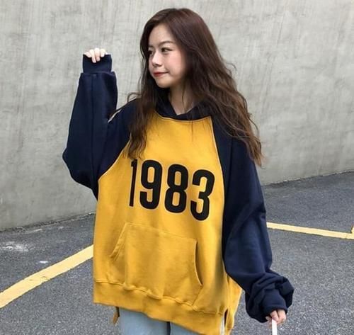 今年流行“卫衣套大衣”,适合奔四奔五女人穿,高贵上档次