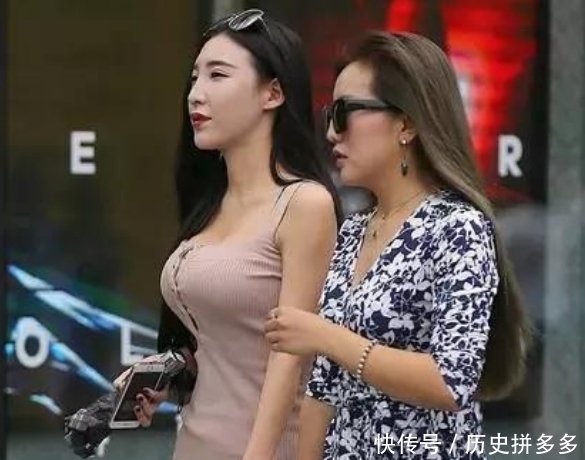  街拍好身材个性的美女，凹凸有致S型身材轻松勾勒出来