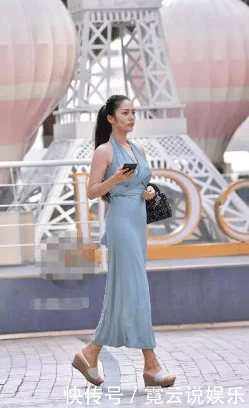 来说|街拍美女谁说有肉感的女生不能轻松驾驭吊带裙的