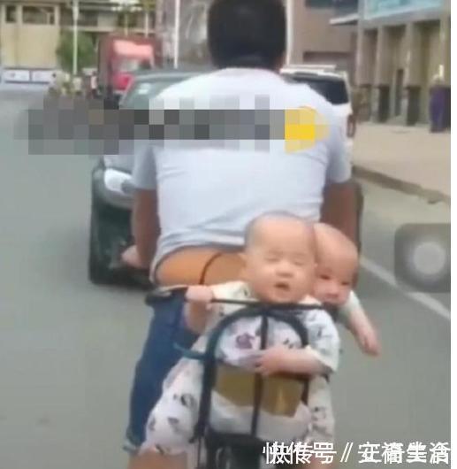 爸爸|双胞胎坐爸爸自行车座后打瞌睡,网友笑称:活着就不错啦