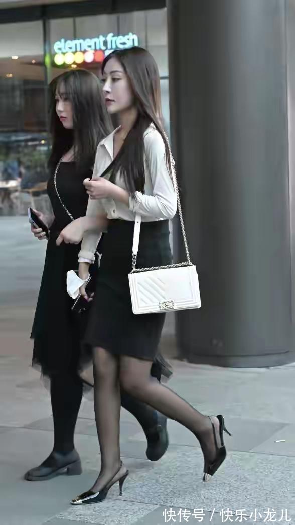 白衬衫 美女身穿白衬衫搭配黑短裙,如此简单又经典的搭配,依然那样美