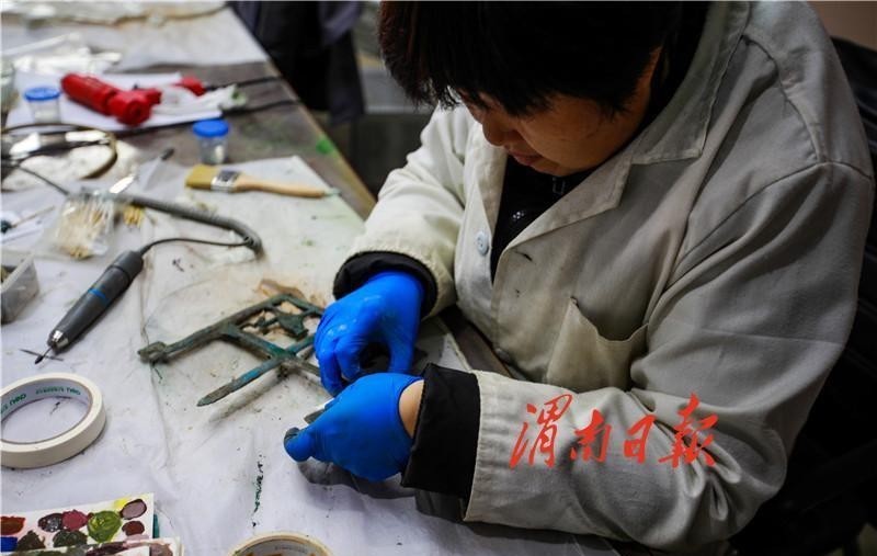 重现|修复文物 重现光彩