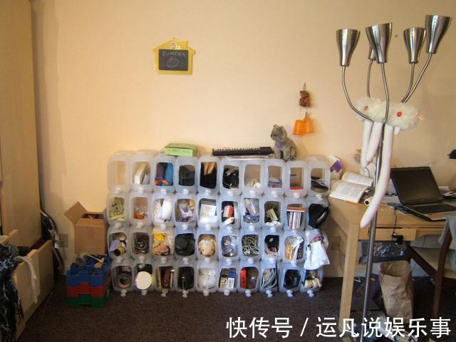 攒了40个塑料桶列成一摞,一格一格当储物柜用,没想到在小区火了