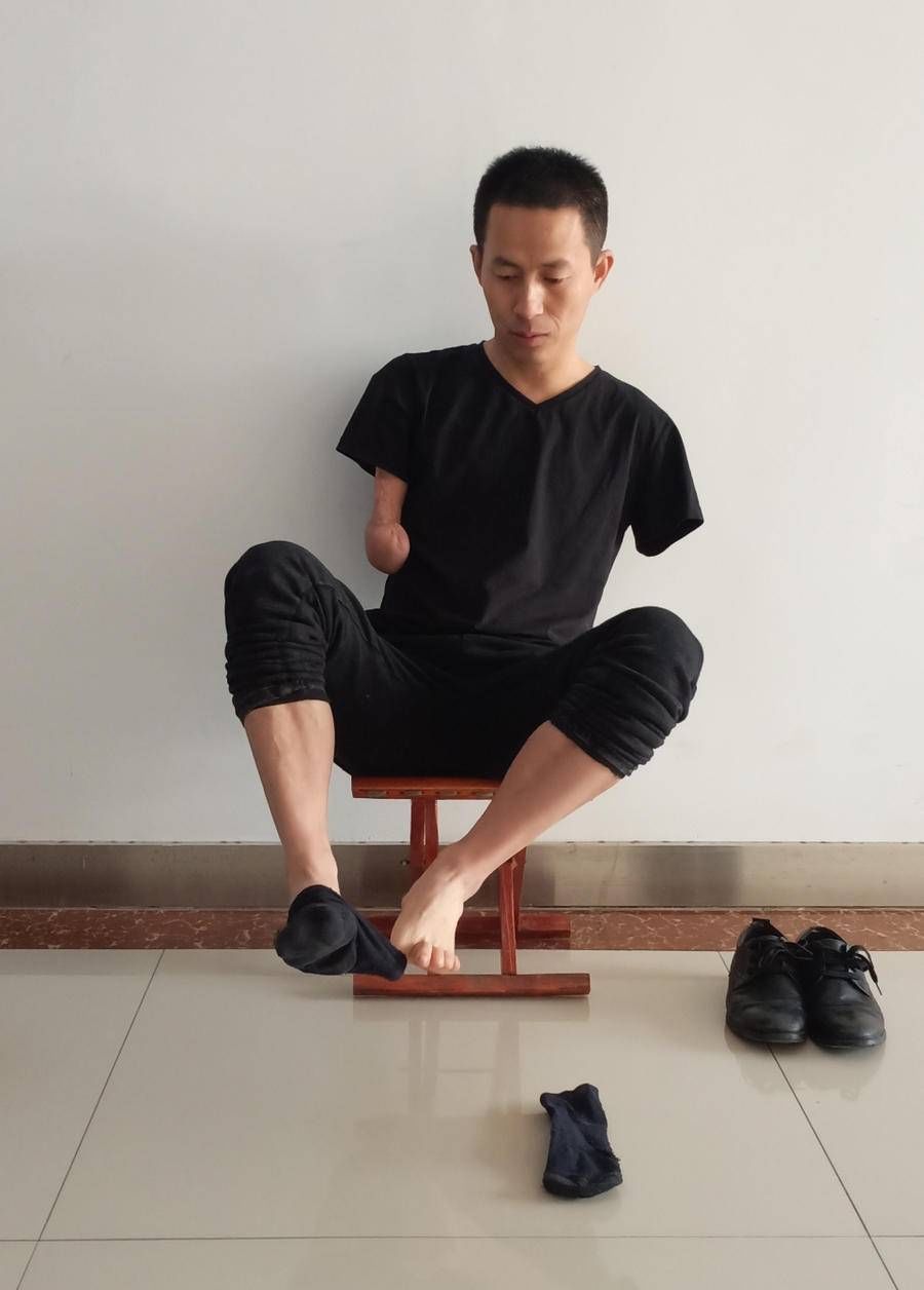 证书|无臂健将丁二伟的逆袭