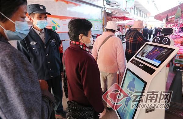 上岗|昆明篆新农贸市场智能测温机器人上岗值守