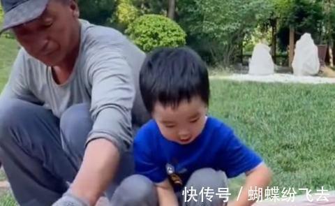 萌娃|北京一萌娃遇到工人在铺砖,下一秒竟和大叔默契配合,网友:真棒
