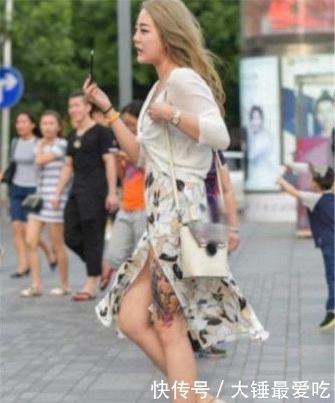 迷人靓丽的美女街拍身材高挑有型的美女,散发十足女人味