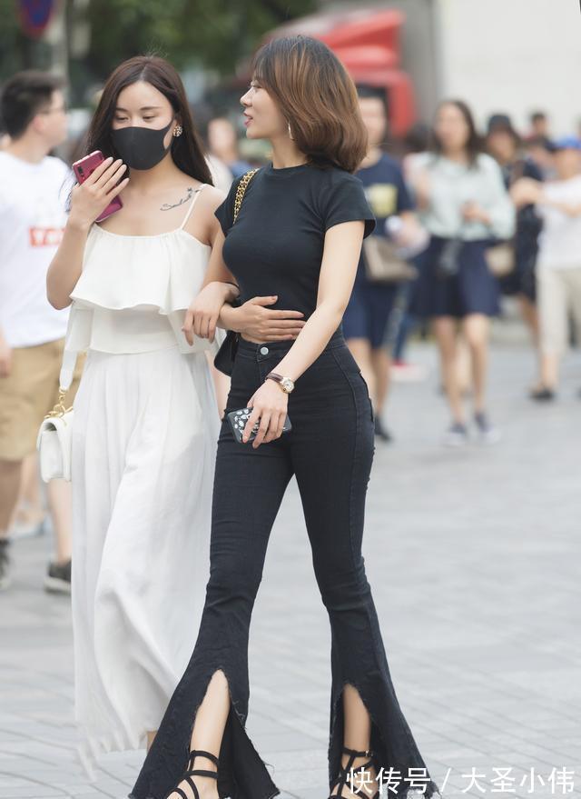 街拍 美女街拍:“黑白双煞”姐妹花,左边的有老公,右边的美女有人想娶吗?