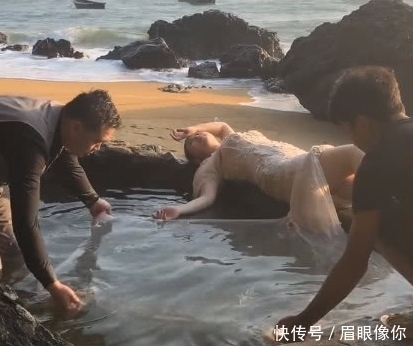 成片|奇闻:新娘躺水边纹丝不动,两个男人在旁边扯裙子,成片惊艳