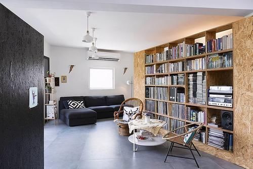 客厅|客厅做了一个超大柜子,一边是电视墙,一边是大书柜,确实很实用