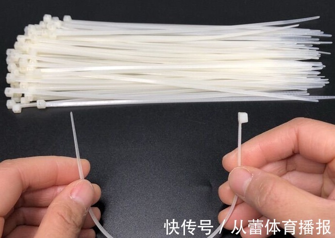 原来扎带上有一个小机关,不用剪断,一碰就能打开,可以重复使用
