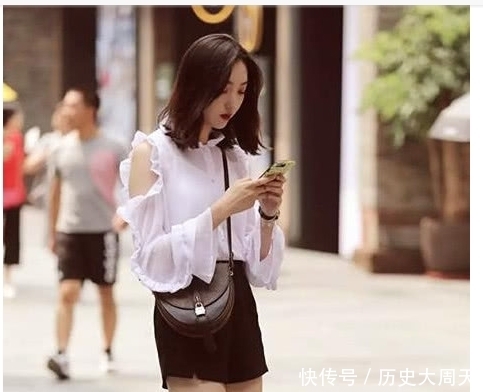 街拍:打扮时尚展现优美的曲线,是个精致的女人