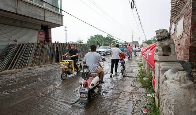 站在南关石桥上可望见鼓楼，地震后重建的石拱桥为何被拆掉