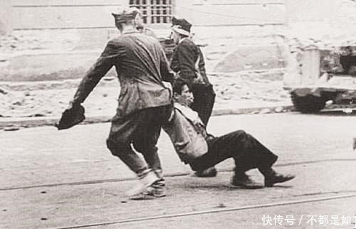 二战|二战老照片被拖出去枪毙的犹太难民，心肠狠毒的纳粹集中营女兵