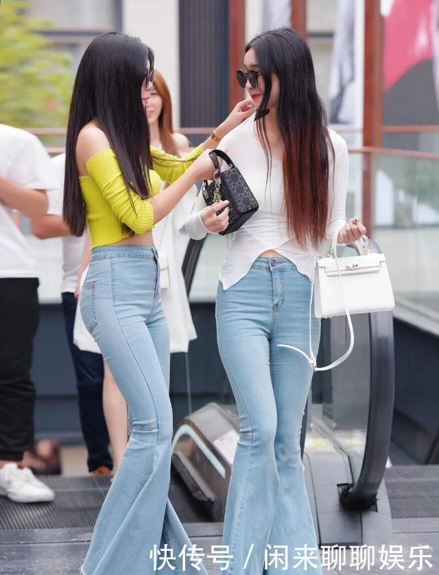 衬衫裤|深蓝色挂脖长袖上衣搭配白色牛仔裤,设计感十足,突出女神气质