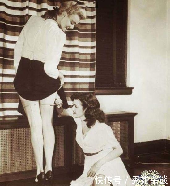 图六|一组罕见的历史老照片:图六肥猪赛大象,图九美女正在腿上画丝袜