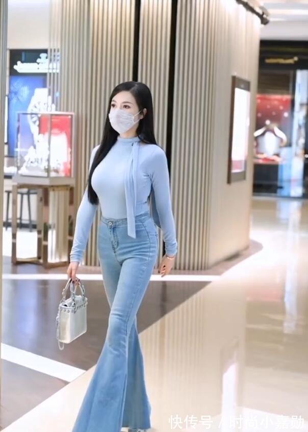 t恤 历久弥新的喇叭裤造型,传递出成熟女性魅力