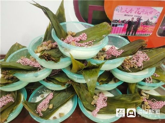 开展|共庆端午佳节 济宁广联医药开展包粽子进社区活动