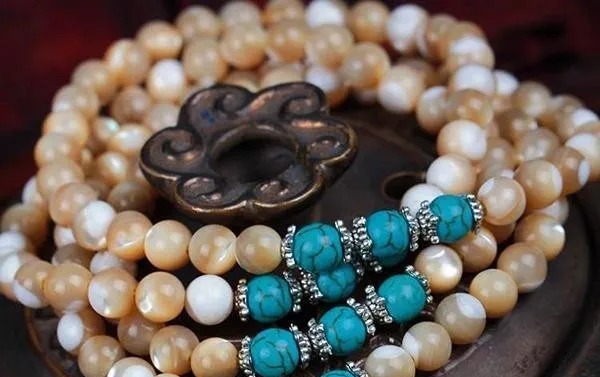 孔雀翎砗磲|冒充砗磲的文玩摇身一变又回来了