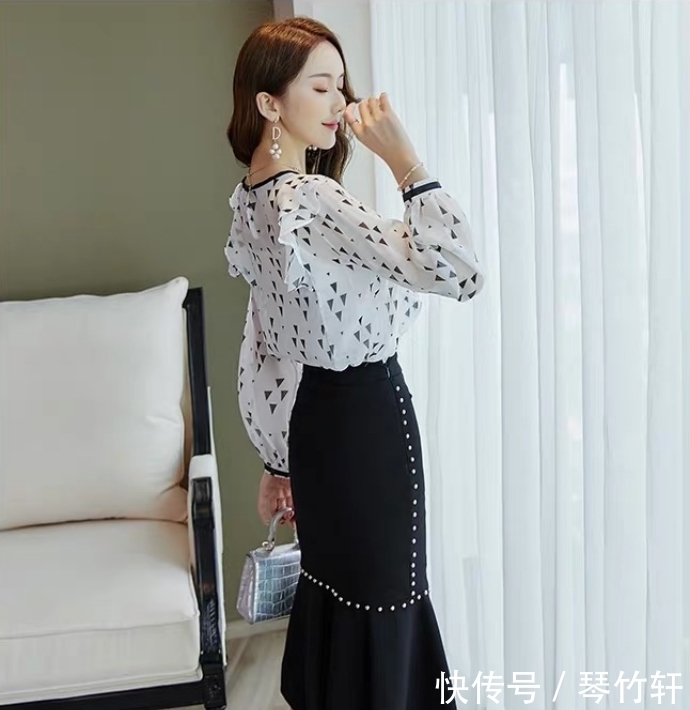套装裙:清新温柔雪纺衫搭配不规则鱼尾裙,凸显女性曼妙身材