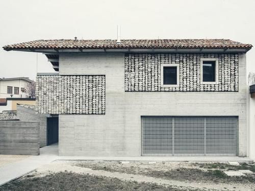 外墙|一根钢筋，串上一块块石子做外墙，多用个10年完全没有问题