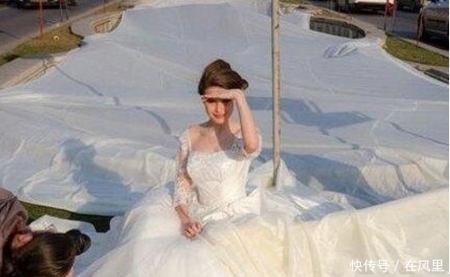 婚礼当天新娘穿99米婚纱裙,惊艳亮相街头,网友:嫁给了爱情!