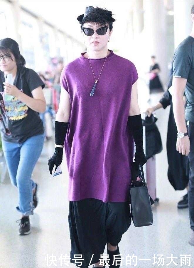 张钧甯真是与众不同,简单穿长款针织衫配短裤,气场太强堪比超模