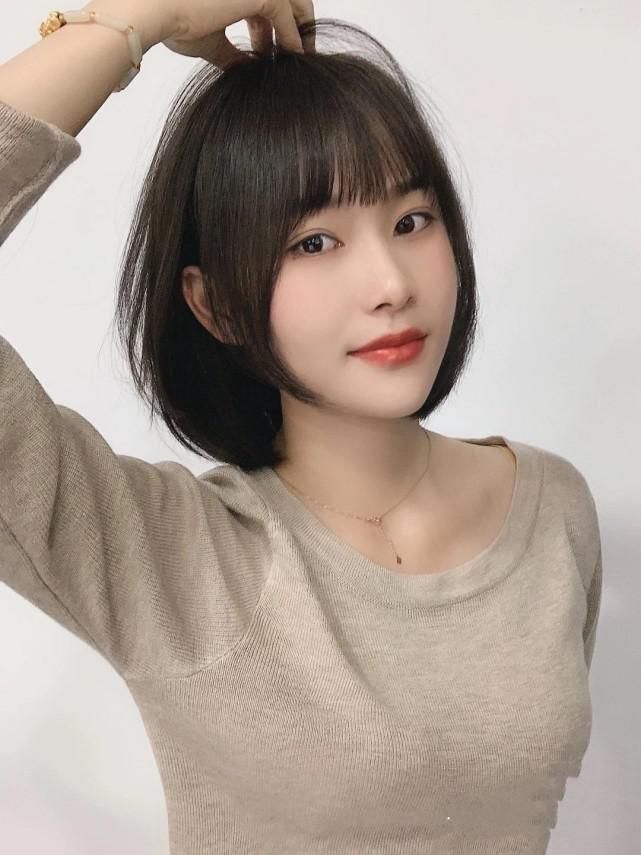 扎丸子头|留长发怎么度过尴尬期?几个小技巧,做个甜美的姑娘