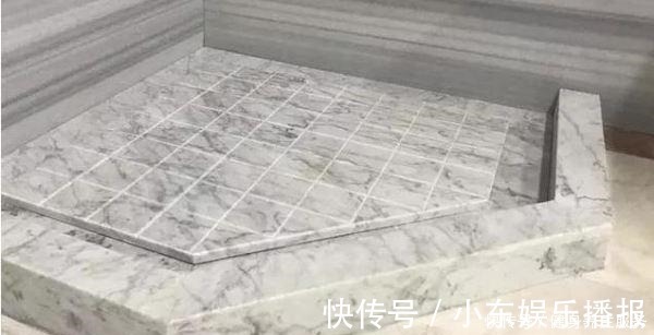 地面|卫生间地面不要再贴瓷砖了，头次见有钱人这样设计，简直太聪明了！