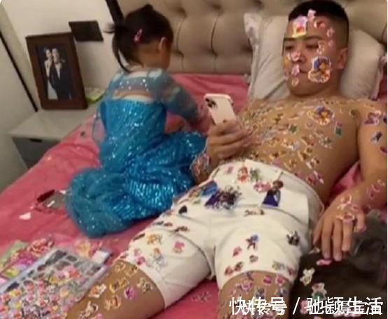 精湛|3岁萌娃在爸爸背上作画,手艺精湛连猫都看傻,网友:幸亏是女儿