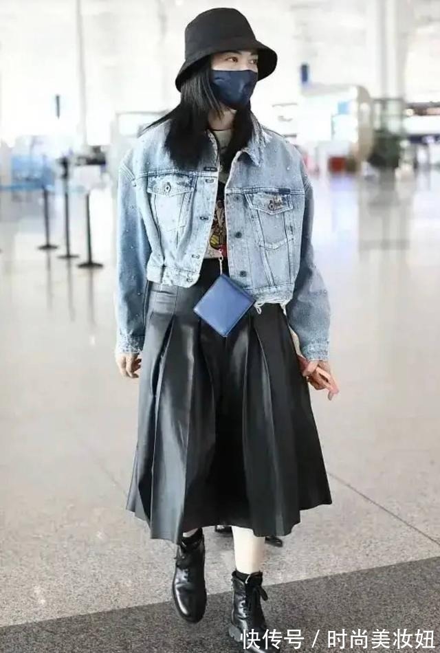 大衣 姚晨真懂“极简穿搭”,一身黑色简约又高级,配黄色帽子好洋气