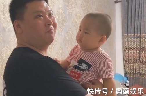 无影手奶爸|“无影手奶爸”抱着娃“偷吃”雪糕火了,娃就说是不是玩不起