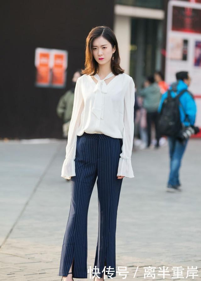 街拍微胖的小姐姐,选择紧身短裙,身材瞬间变得匀称紧致起来