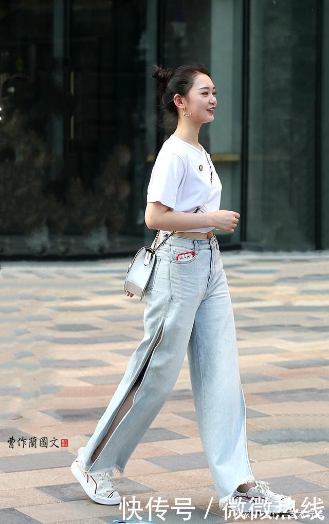 肥腿长裤很单调加上大开气设计，美女穿出青春活力和时髦精感觉