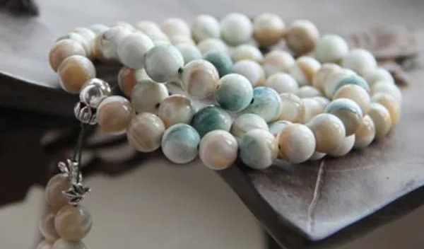 孔雀翎砗磲|冒充砗磲的文玩摇身一变又回来了