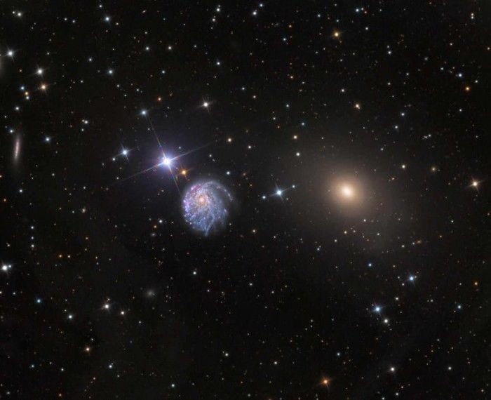 星系团 哈勃望远镜拍摄的壮观图像显示了一个奇怪扭曲的螺旋星系