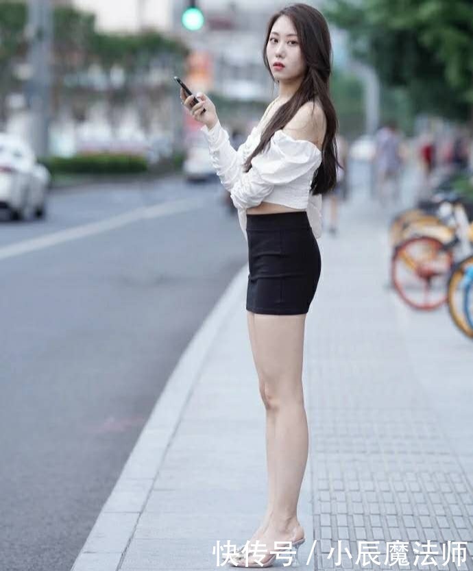 气质型美女,搭配黑色包臀裙,魅力强大