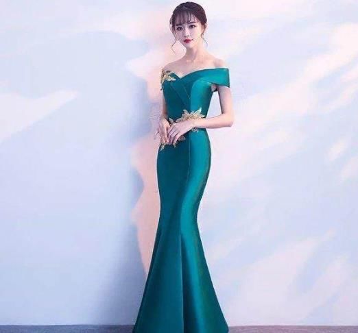 墨绿鱼尾旗袍，展现“只可意会不可言传”的美