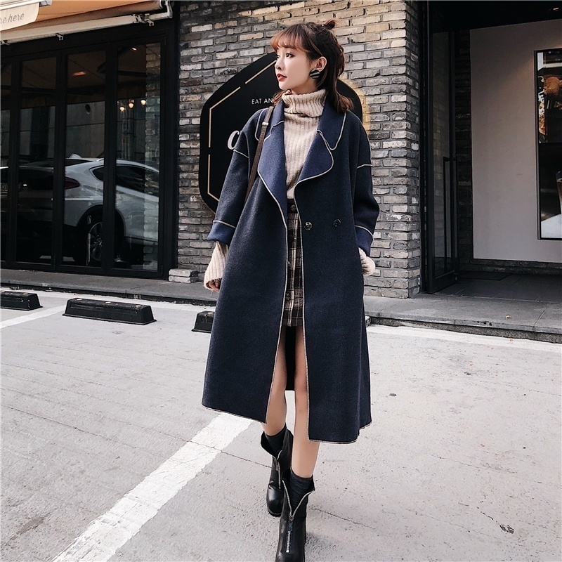 大气 建议大家大衣不要配黑裤子!瞧她那样穿,美得让人猜不出年龄