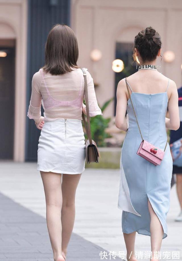 小姐姐 美女换上精致短裙,走在街头,留下优雅的脚印