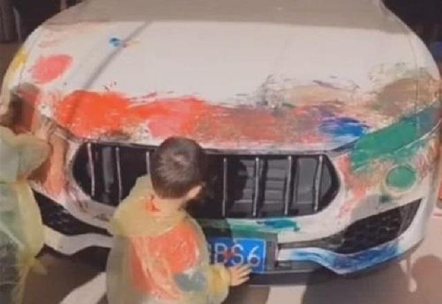 孩子|熊孩子''画毁''玛莎拉蒂,车主却在一旁淡定围观,保安欲劝阻反遭拦