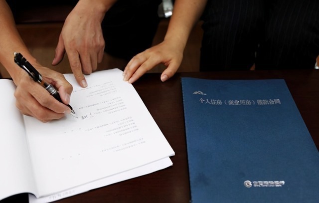 首付款|买房签合同时,不要忘记加上一个附加协议,不然会多掏几十万元