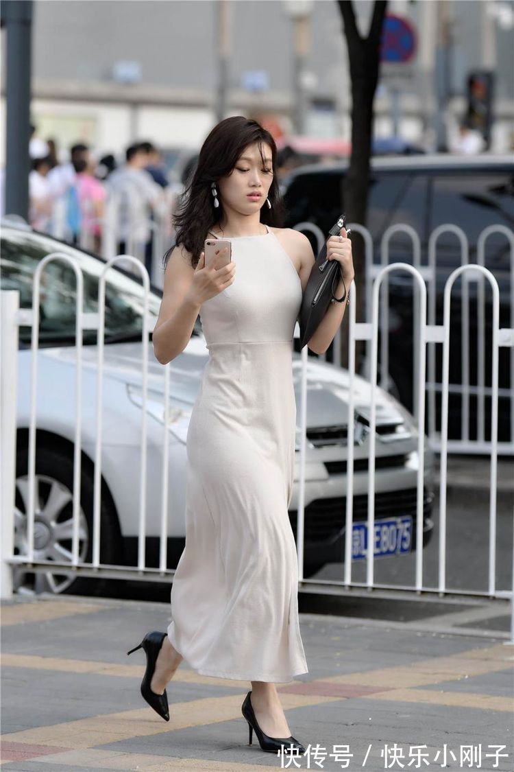 身材|在裙装中,中长款的连衣裙最受欢迎,它很适合大众的身材穿搭