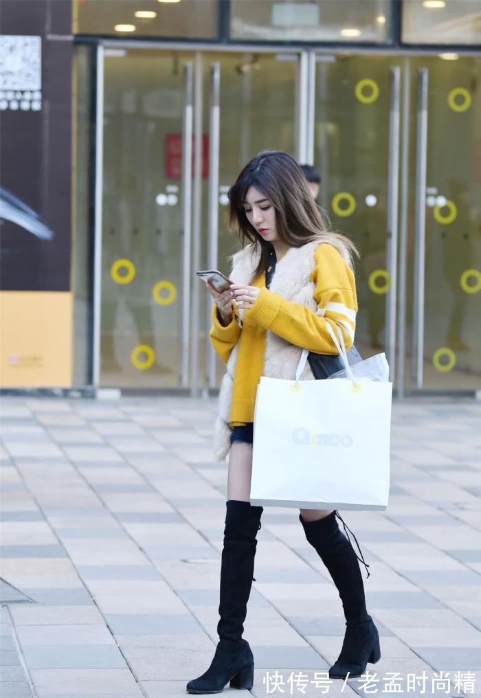 风衣|街拍:美女选择西装搭配九分铅笔裤,风衣披在身上,女强人的风格