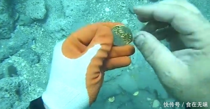 海底|几名潜水爱好者结伴下海游玩,因“海底金光”而收获大笔财富