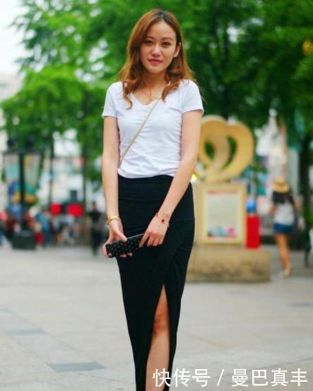 街拍身穿黑裙小美女,雪白如玉的肌肤,让人羡慕