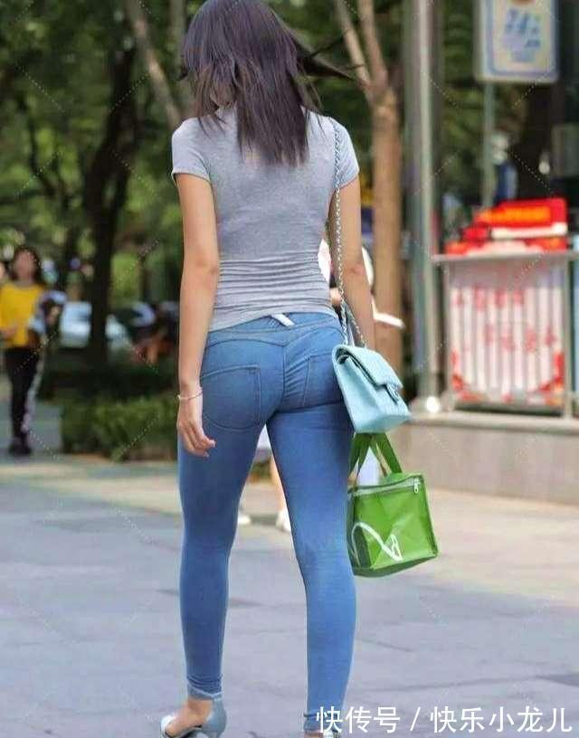 优雅 休闲修身T恤,搭配紧身牛仔裤,尽显职场女性的成熟优雅气质