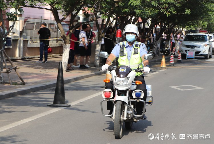 张晓鹏|城阳：考场周边按下“静音键”！高考首日，他们为考生护航