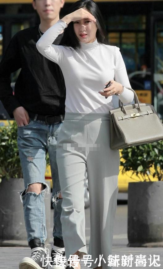 街拍这种正式裤子,不适合女秘书穿,更加适合年轻人选择吧