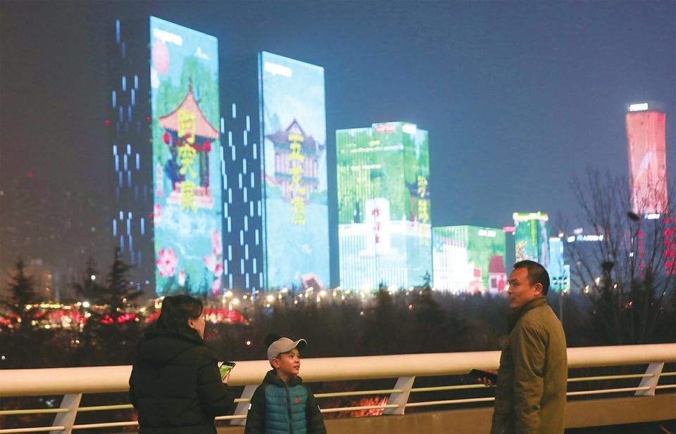 元宵夜，你在经十东路邂逅“二安”没 春节期间经十路56栋楼楼体夜景亮化 下一步打造30公里亮化带